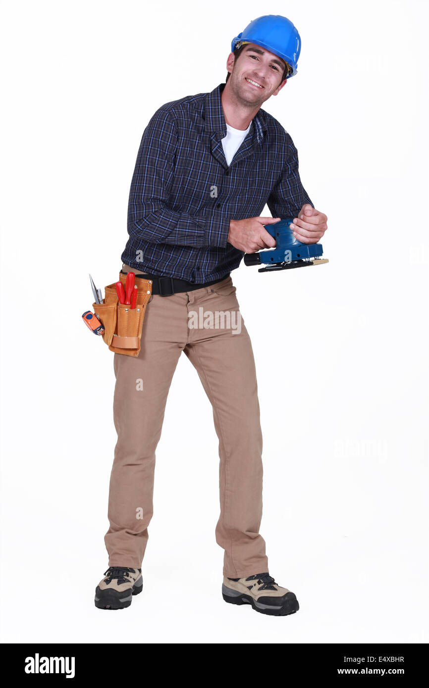 Mann mit macht sander Stockfoto