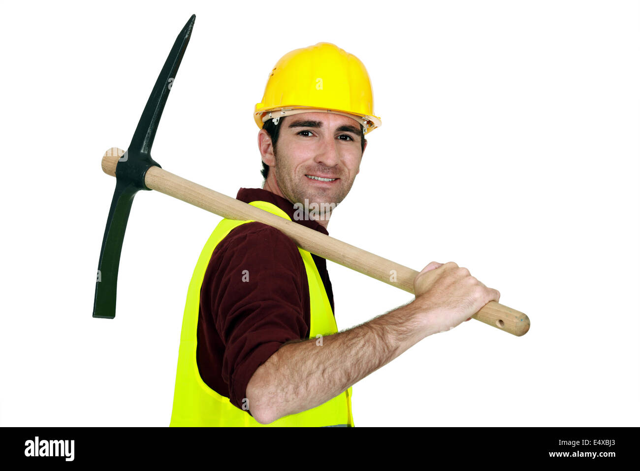 Arbeiter mit Spitzhacke auf seiner Schulter Stockfoto