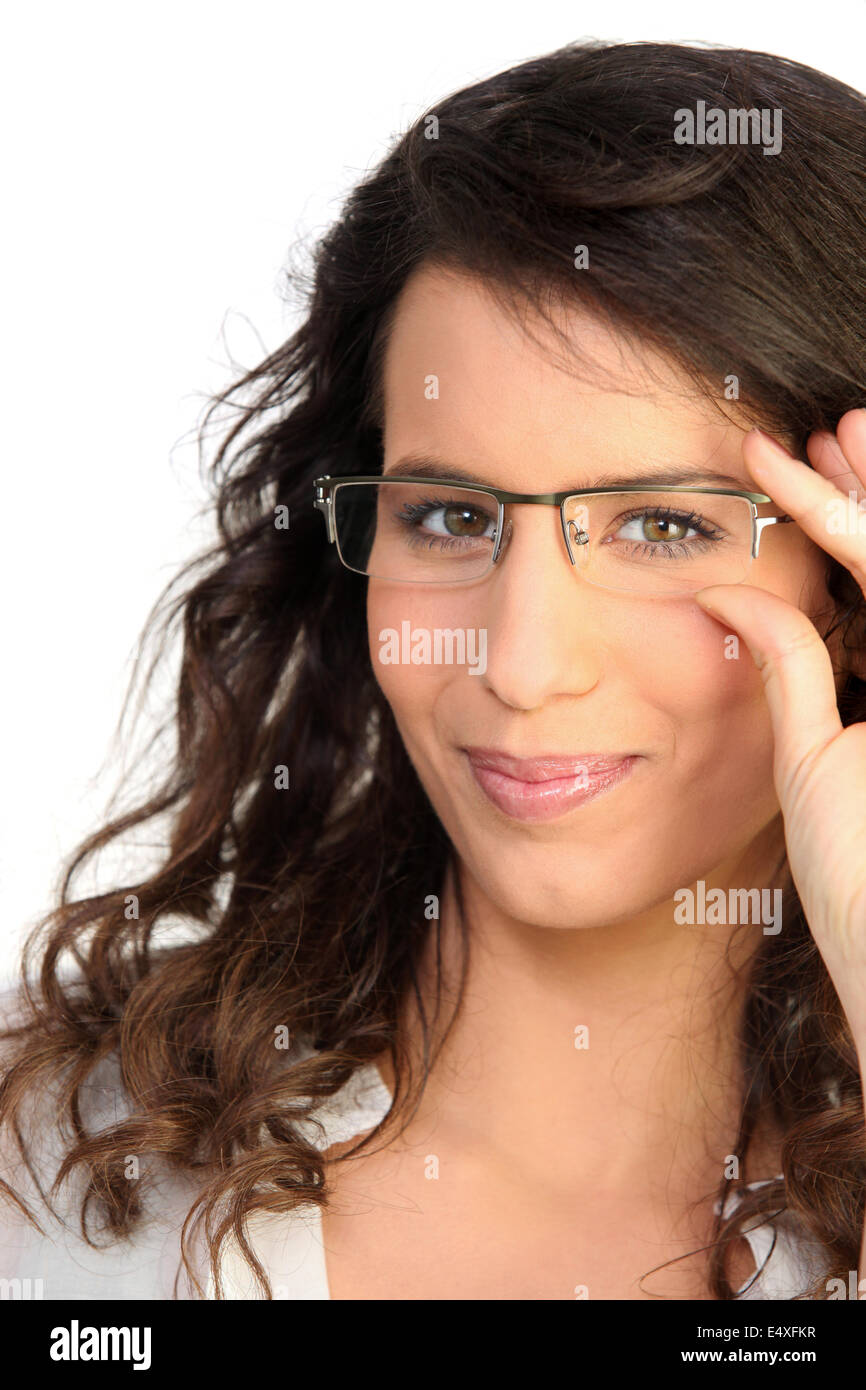 Brünette mit Brille Stockfoto
