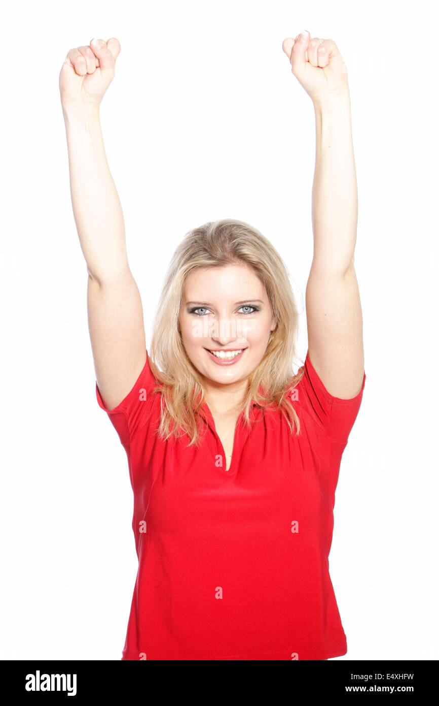 Triumphierend hob die arme Frau Stockfoto