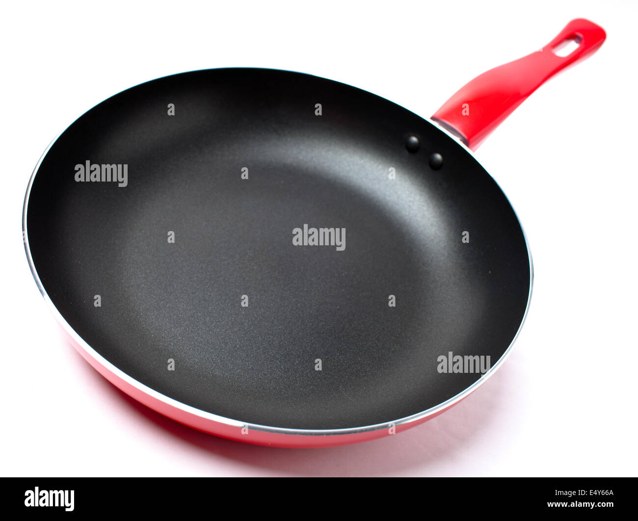 Roten Bratpfanne mit Teflon beschichteten Abdeckung Stockfoto