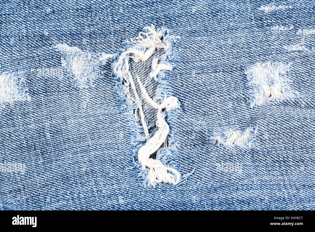 Blue-Denim Jeans Loch Makro Stockfoto
