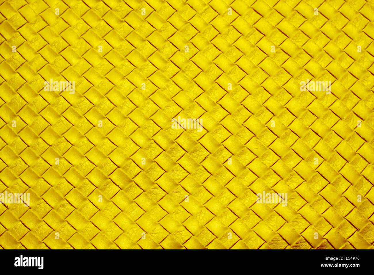 Gewebter goldener Lederhintergrund Stockfoto
