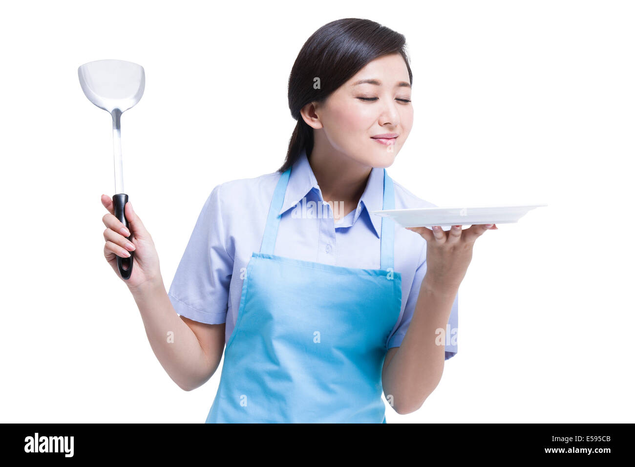 Hausangestellte Kochen Stockfoto