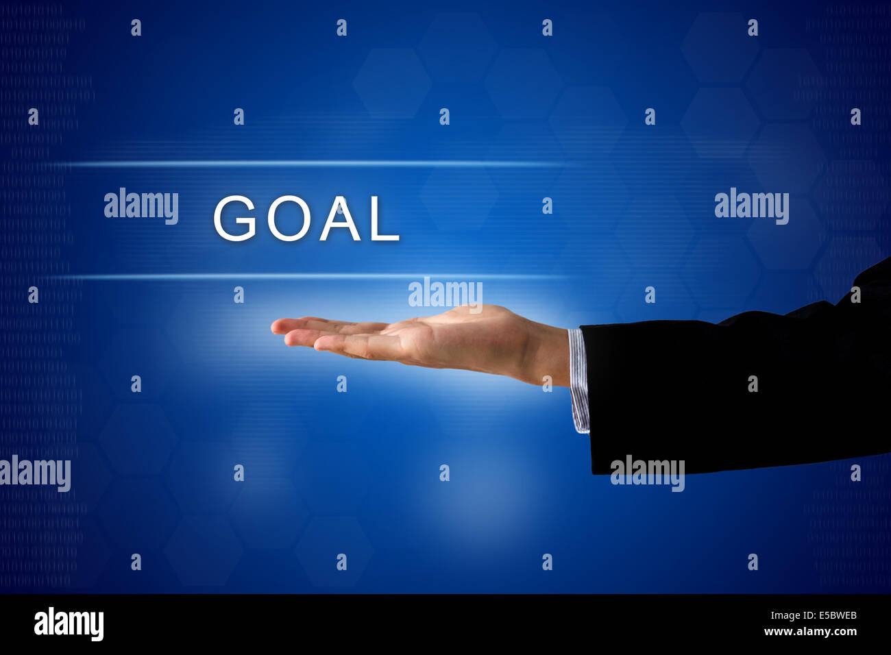 Schaltfläche "Ziel" mit hand auf eine Touchscreen-Oberfläche Stockfoto