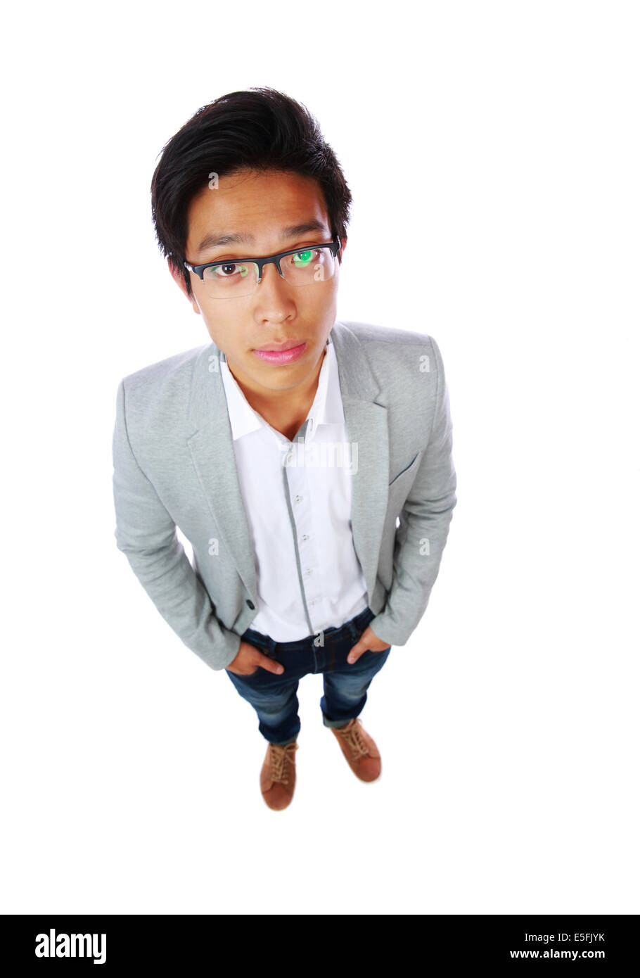Draufsicht Porträt eines schönen asiatischen Mannes auf weißem Hintergrund Stockfoto