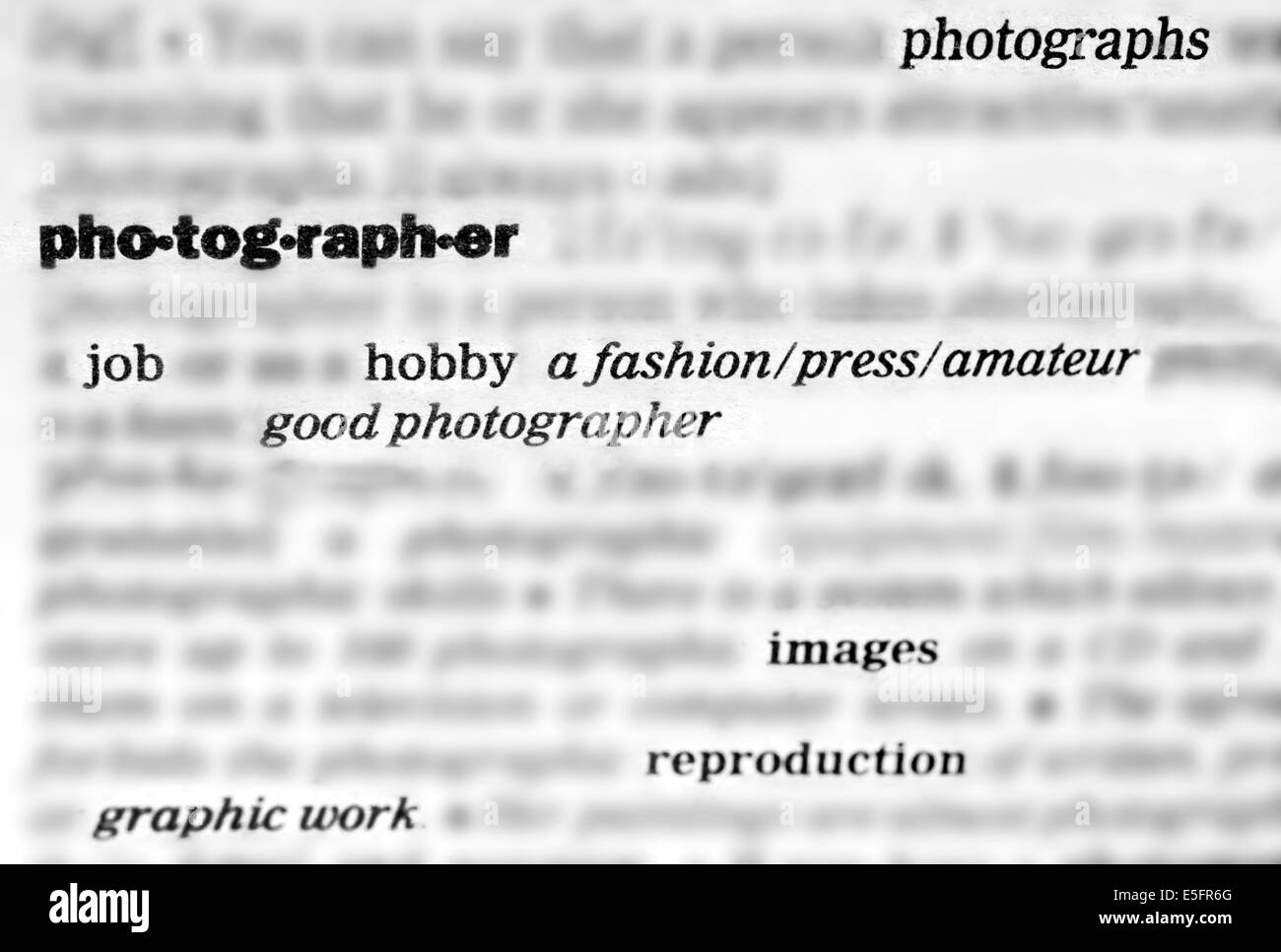 Wörterbuch-Wörter und Phrasen in Bezug auf Fotografie, Bewegungsunschärfe Hintergrund Stockfoto