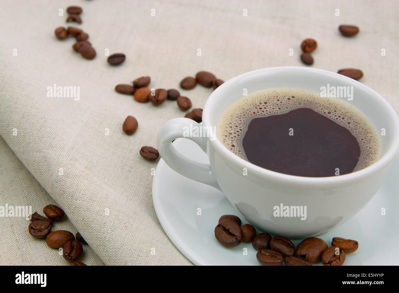 Kaffeetasse Auf Jutestoff Stockfoto