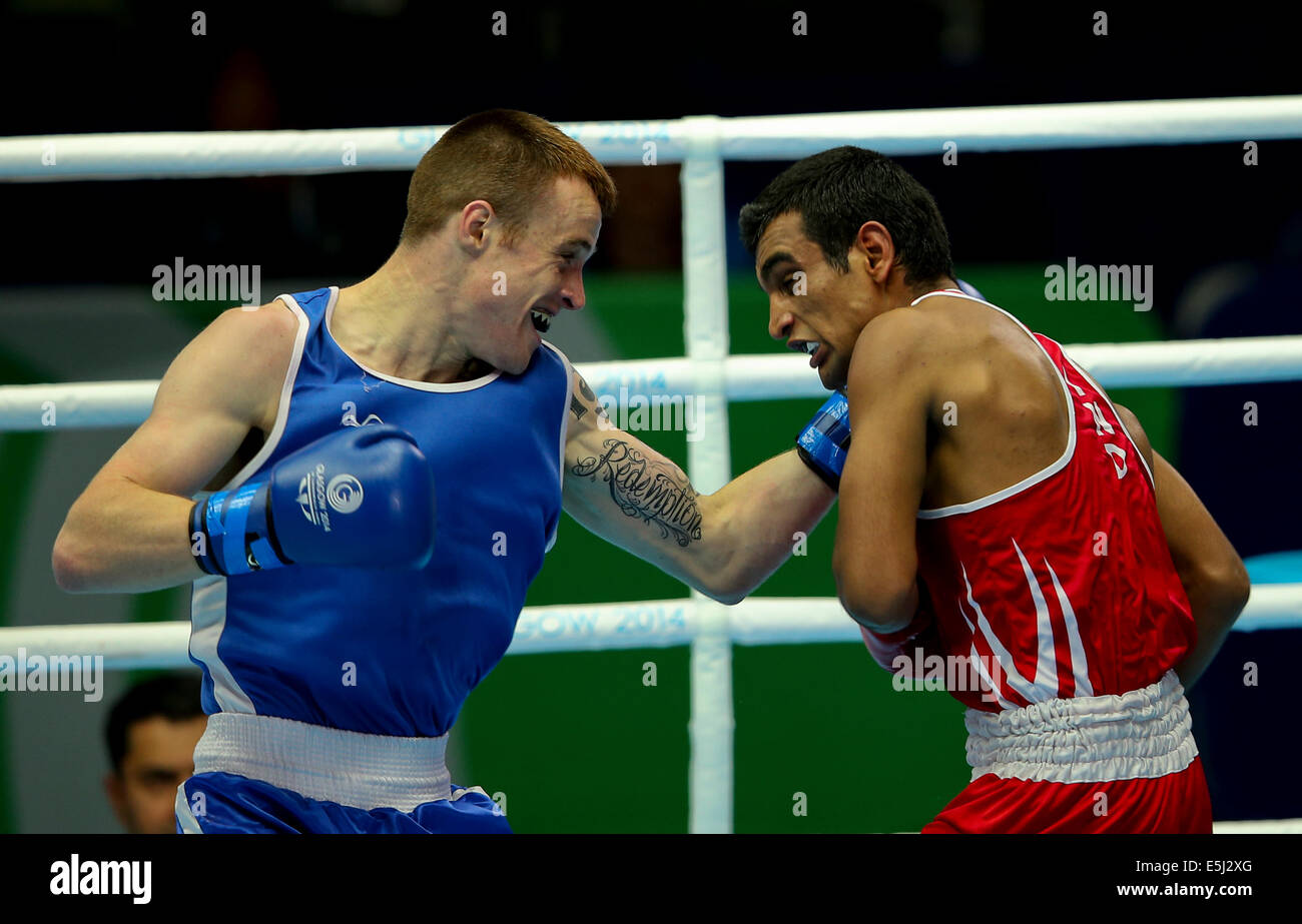 Scotstoun, Glasgow Schottland 1. August 2014. Tag 9 Boxen Halbfinale.  Mandeep Jangra IND schlägt Steven Donnelly NIR Credit: ALAN OLIVER/Alamy Live News Stockfoto