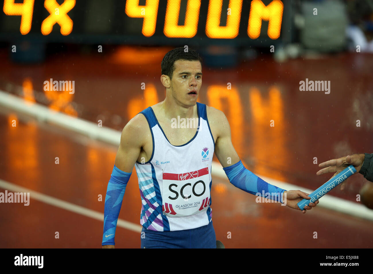 Hampden Park, Glasgow 2. August 2014. Commonwealth Games Day 10 Leichtathletik.  Männer 4 x 400-Relais endgültig. England nehmen Gold. Bahamas statt Silber und Bronze & Tobago Trinidad nehmen. Greg Louden, schottische Anker.  SCO Platz 5. Bildnachweis: ALAN OLIVER/Alamy Live-Nachrichten Stockfoto