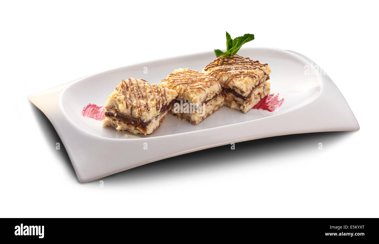 Nachtische. Vanille-Kuchen und Schokolade Maus isoliert auf weißem Hintergrund Stockfoto