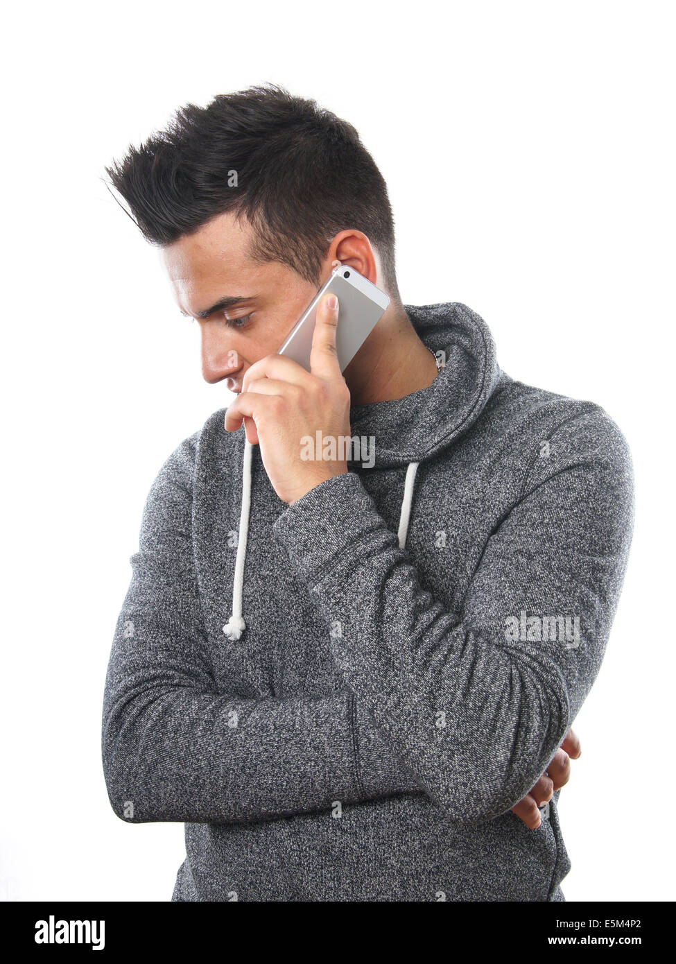 junge türkische Mann mit Handy Stockfoto
