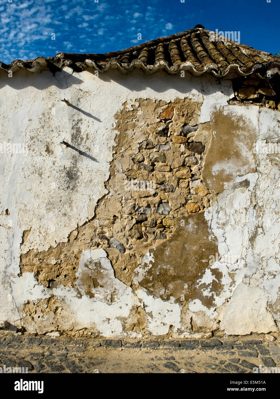 Steinmauer Textur in einem Haus mit antiken Steinen getragen. Stockfoto