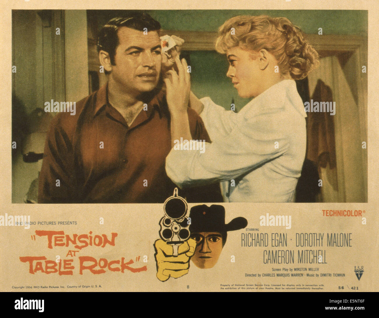 Spannung am Tisch ROCK, US Lobbycard, von links: Richard Egan, Dorothy Malone, 1956 Stockfoto