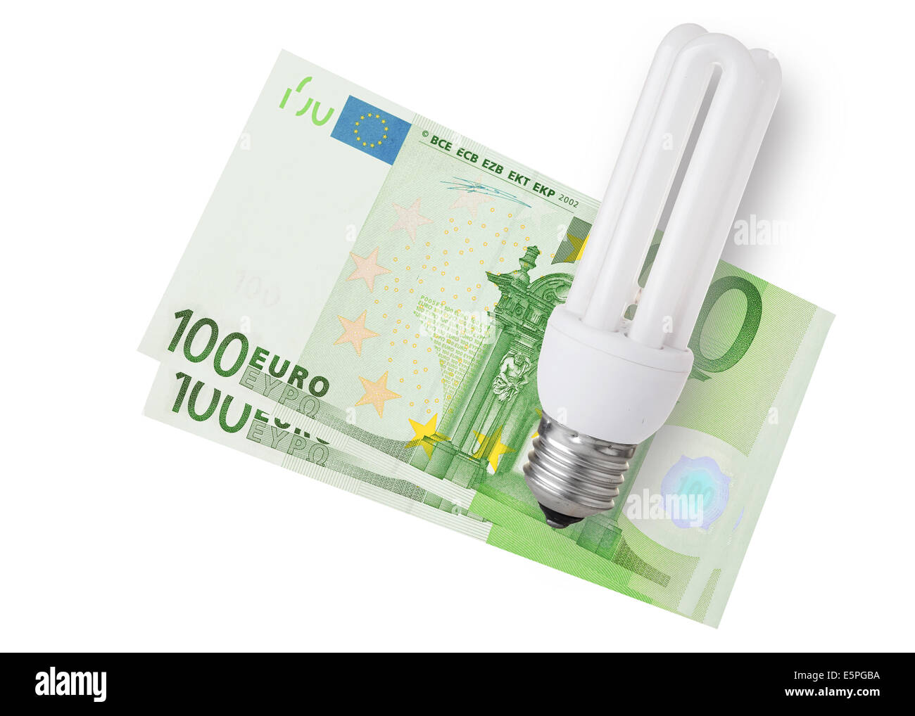 Energy Saver Glühlampe über Euro-Scheine auf weißem Hintergrund Stockfoto