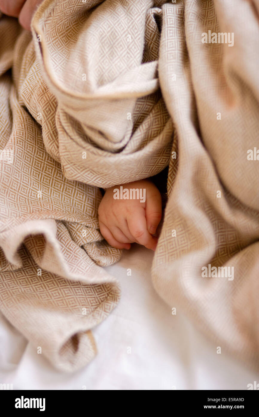 Hand eines 6 Monate alten Babys. Stockfoto