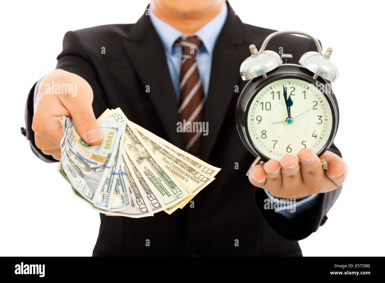 Geschäftsmann Betrieb Geld und Uhr. Zeit ist Geld-Konzept Stockfoto