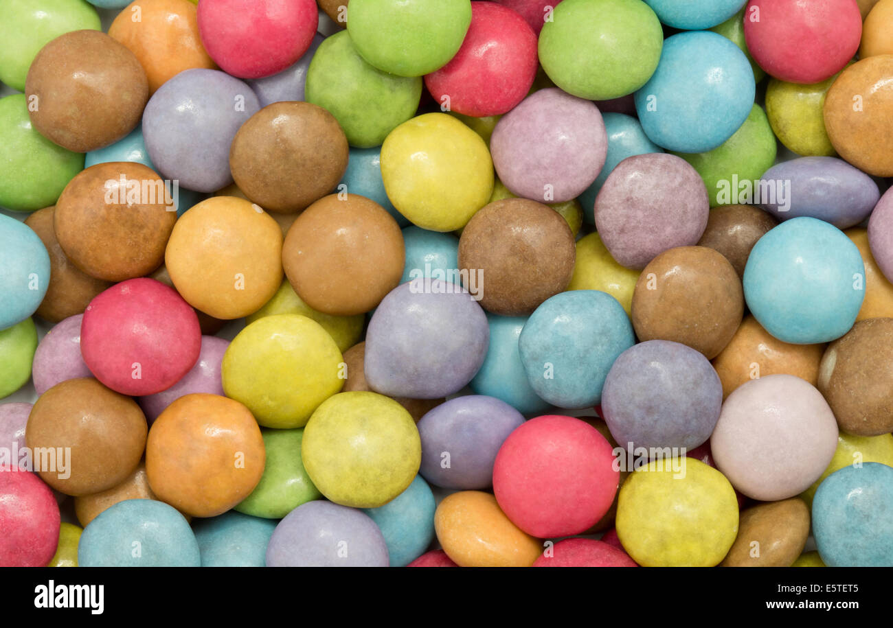 Schokolade Popfarben, farbigen Hintergrund Stockfoto