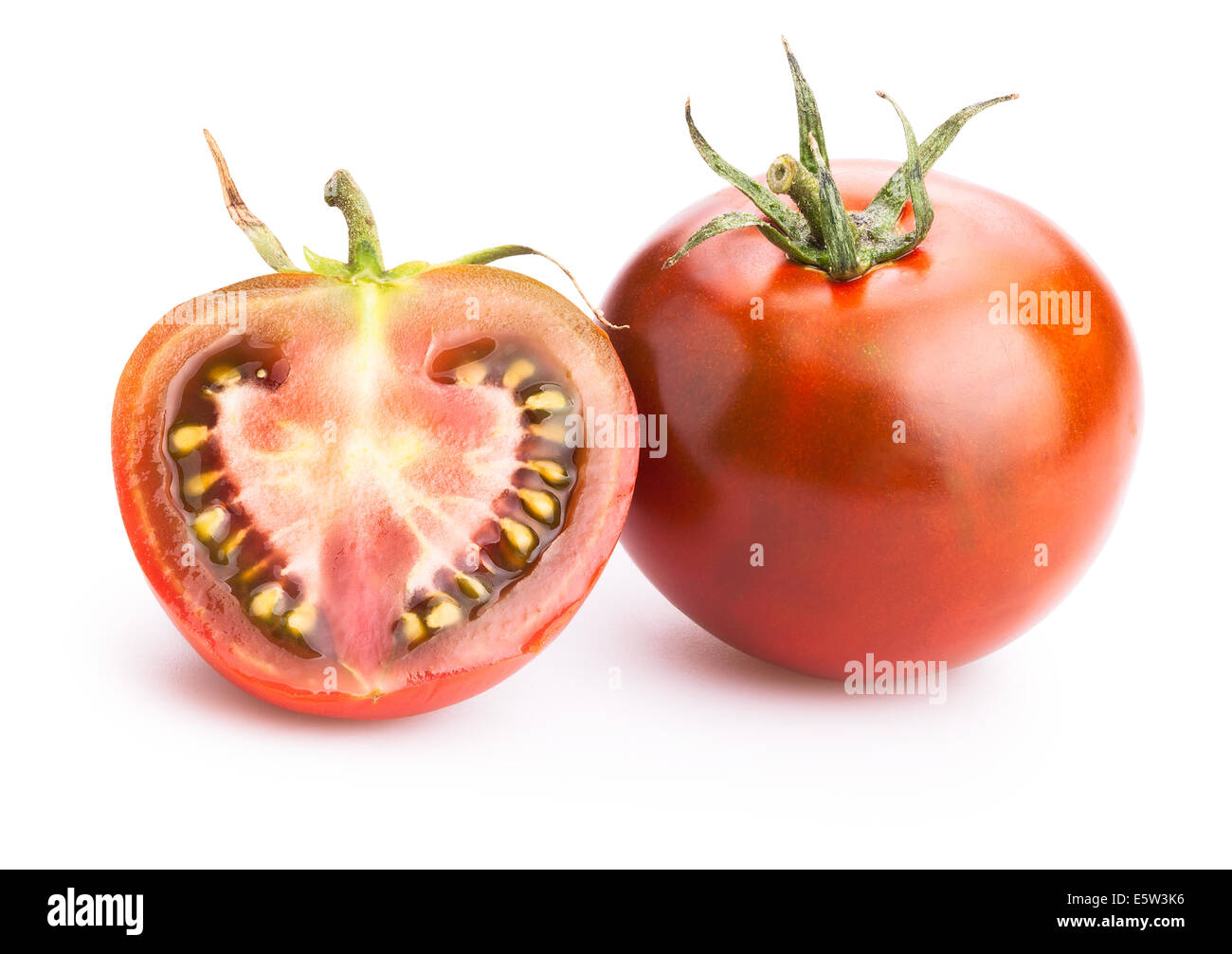 schwarze Tomaten isoliert Stockfoto