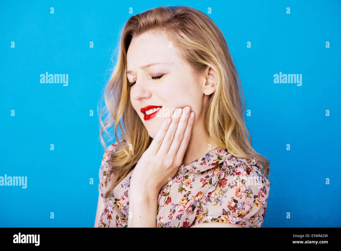 Frau mit Zahnschmerzen Stockfoto