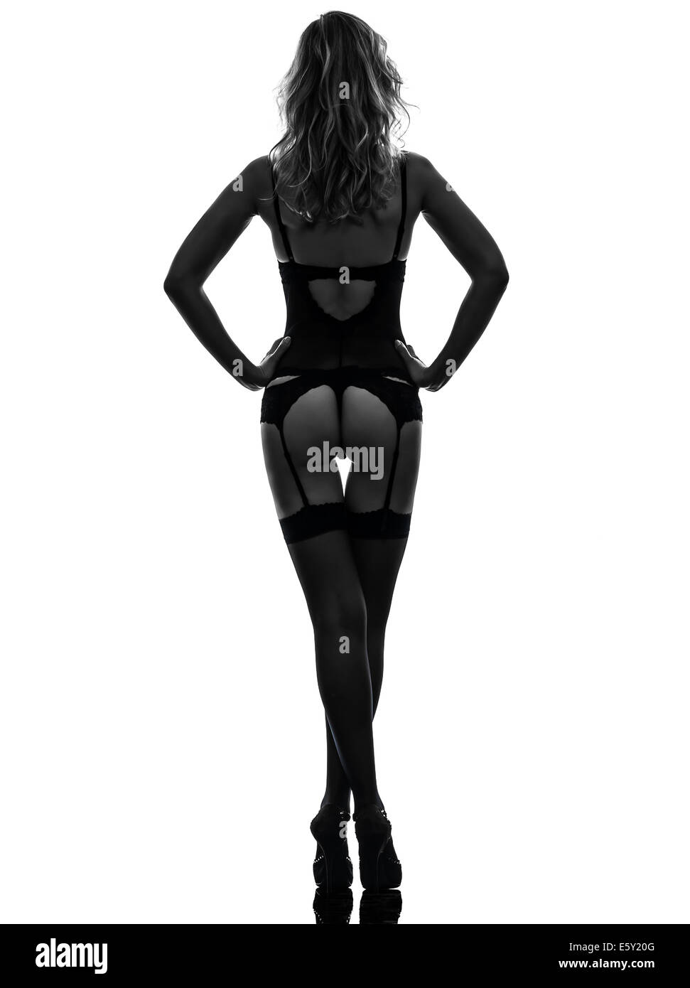 Eine Schone Sexy Hinten Sehen Sexy Frau Hoschen Unterwasche Strumpfwaren In Silhouette Studio Auf Weissem Hintergrund Stockfotografie Alamy