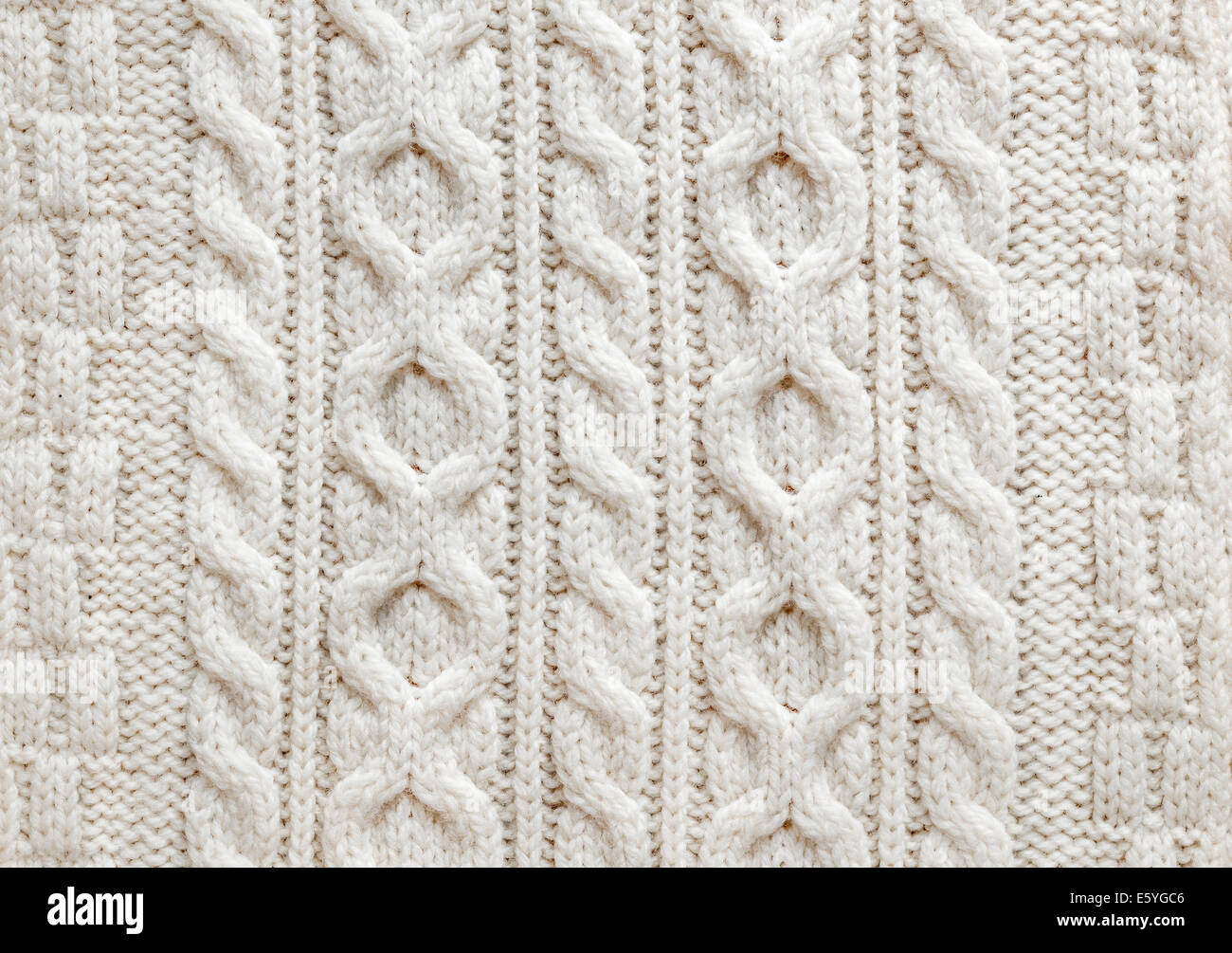 Stricken Sie Textur der Stoff leicht Naturwolle gestrickt mit Zopfmuster, als Hintergrund Stockfoto