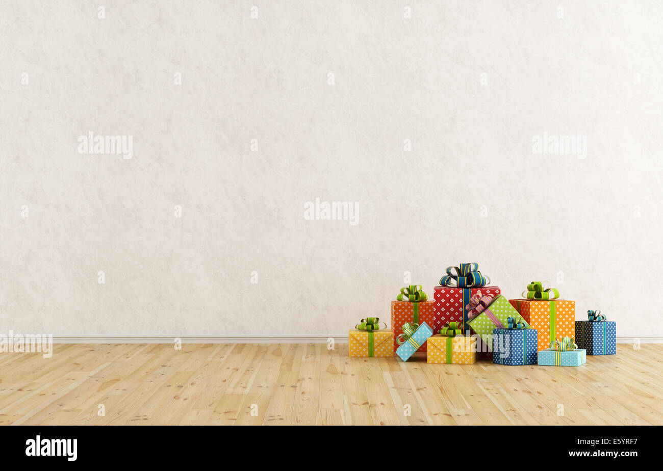 Leeren Raum mit bunten Geschenk auf Holzboden Stockfoto