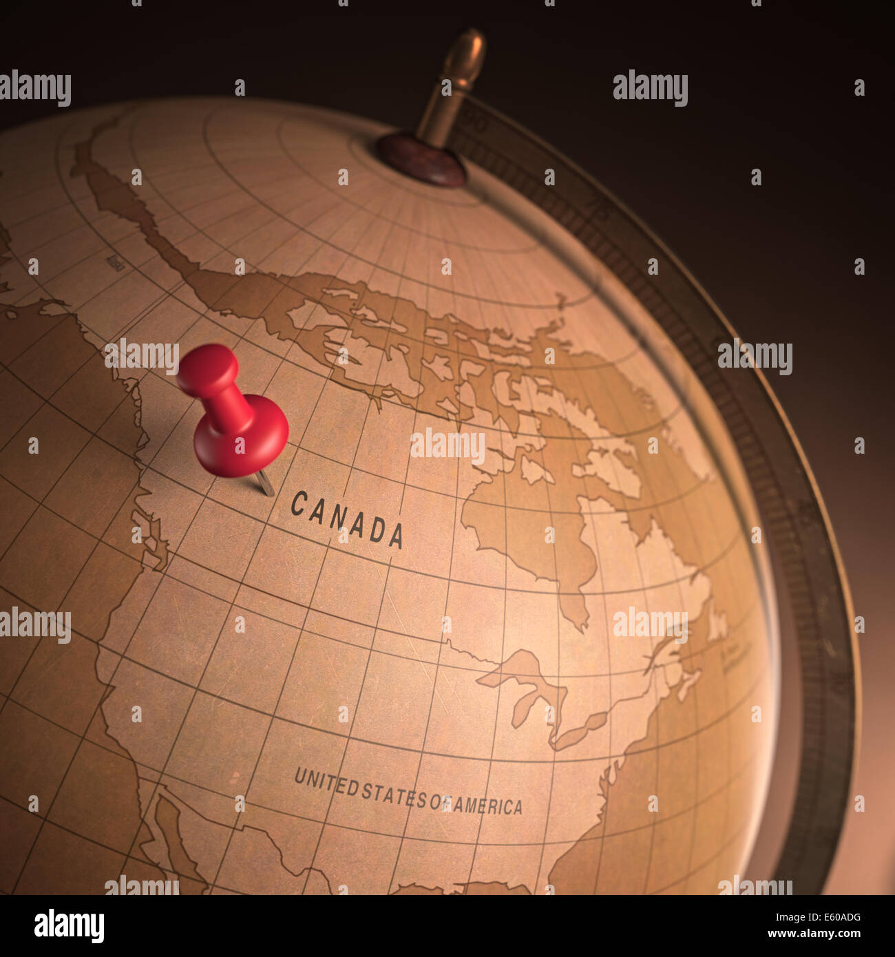 Antiker Globus mit dem Canada durch den Stift markiert. Clipping-Pfad enthalten. Stockfoto