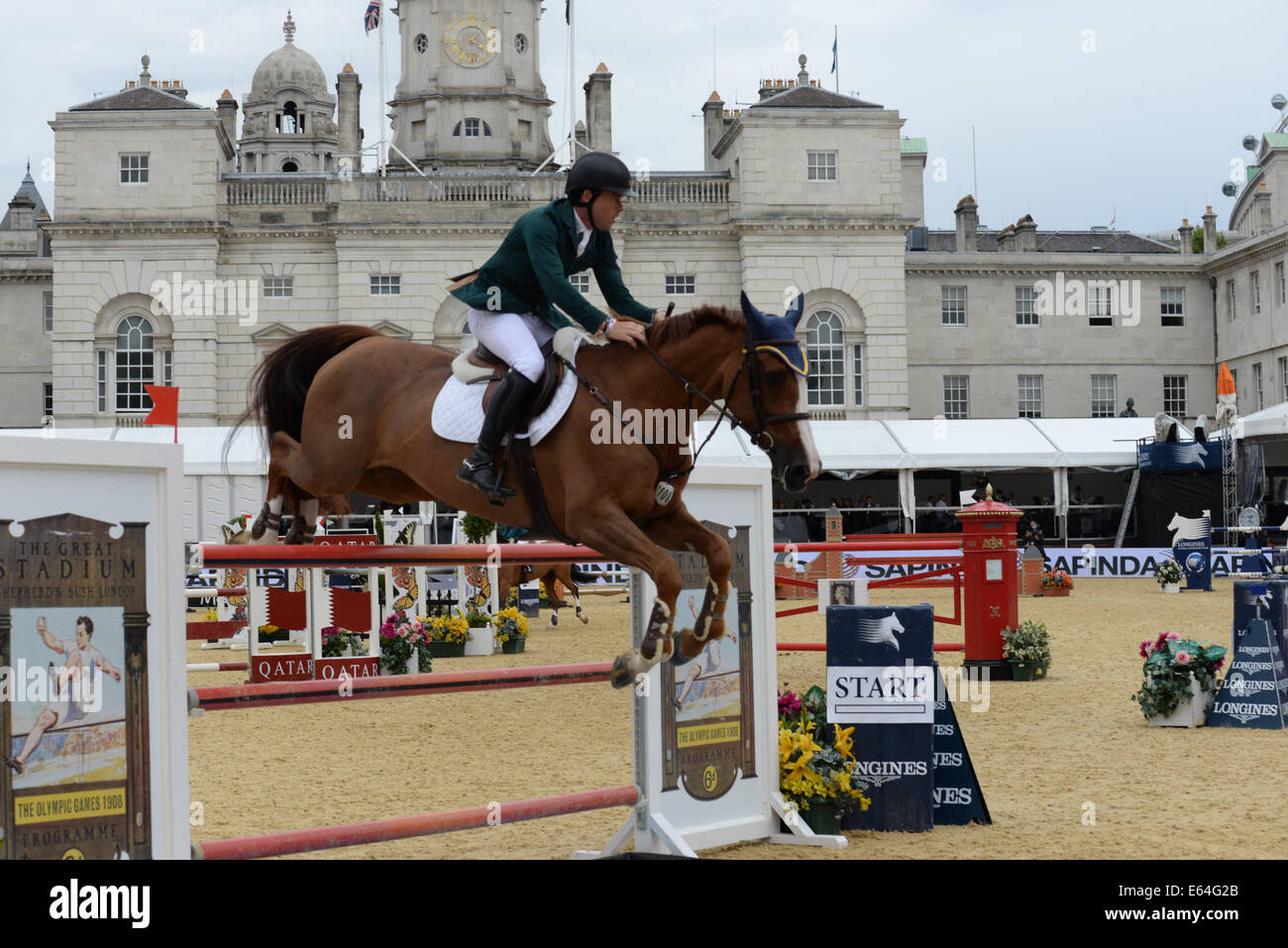 London, UK. 14. August 2014. Conor Swail teilnehmen Pferd Springprüfung bei Longines Global Champions Tour am Horse Guard Parade in London. Bildnachweis: Siehe Li/Alamy Live News Stockfoto