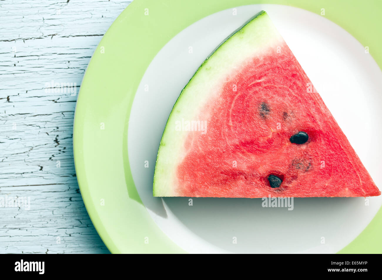 die in Scheiben geschnittenen Wassermelone auf Küchentisch Stockfoto