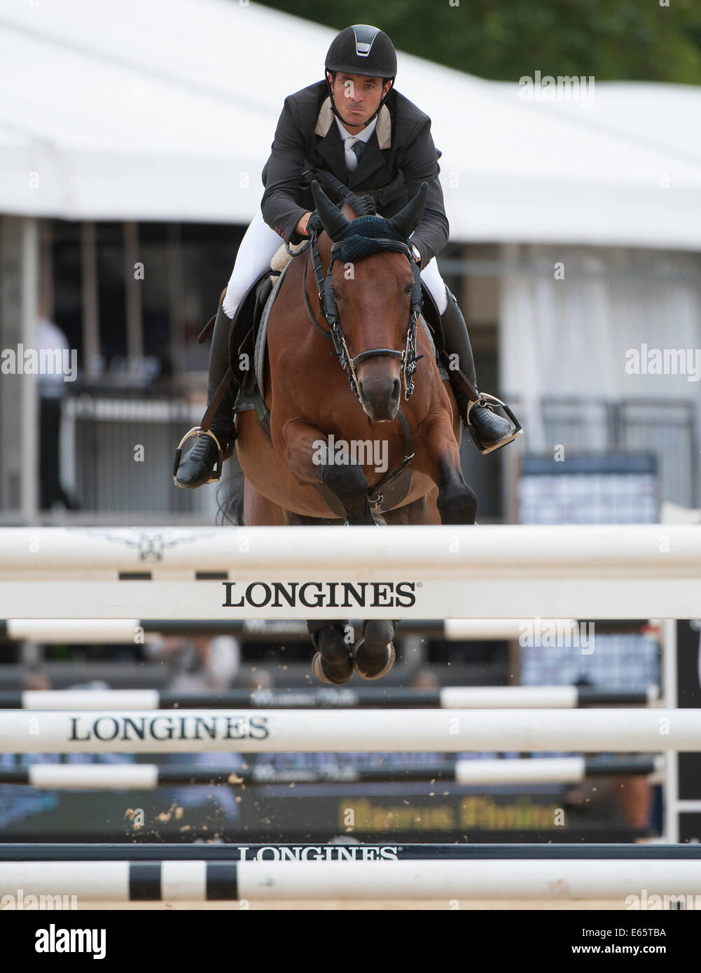 London, UK. 15. August 2014.  Der Longines Global Champions Tour von London. Steve Guerdat [SUI] Concetto Son in Aktion während des CSI5 * Sapinda Prix Reiten. Bildnachweis: Stephen Bartholomäus/Alamy Live-Nachrichten Stockfoto