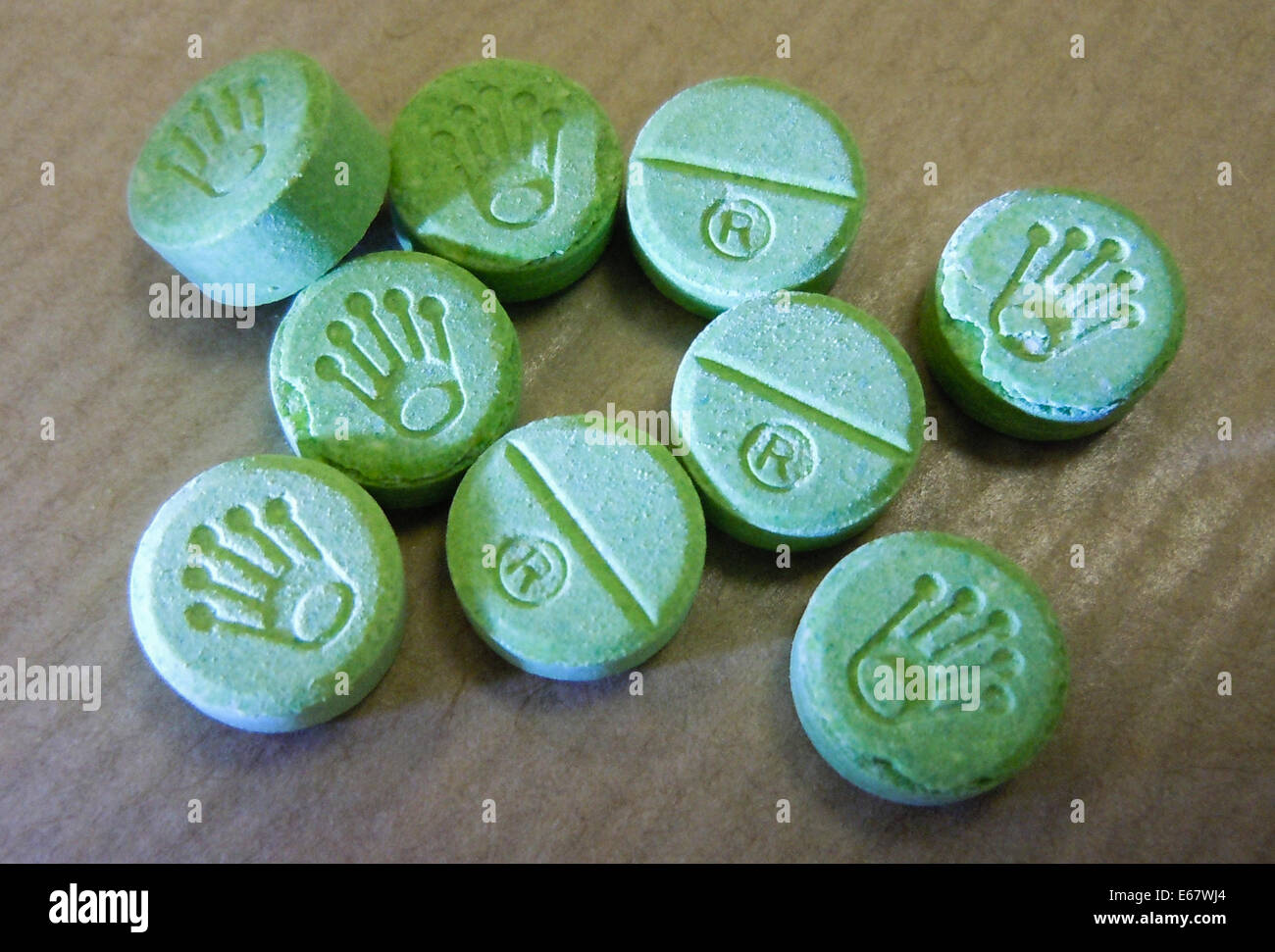 Gefälschte Ecstasy-Pillen bekannt als "Green Rolex" mit PMA für zahlreiche Todesfälle verantwortlich. Siehe Beschreibung für mehr Informationen. Stockfoto