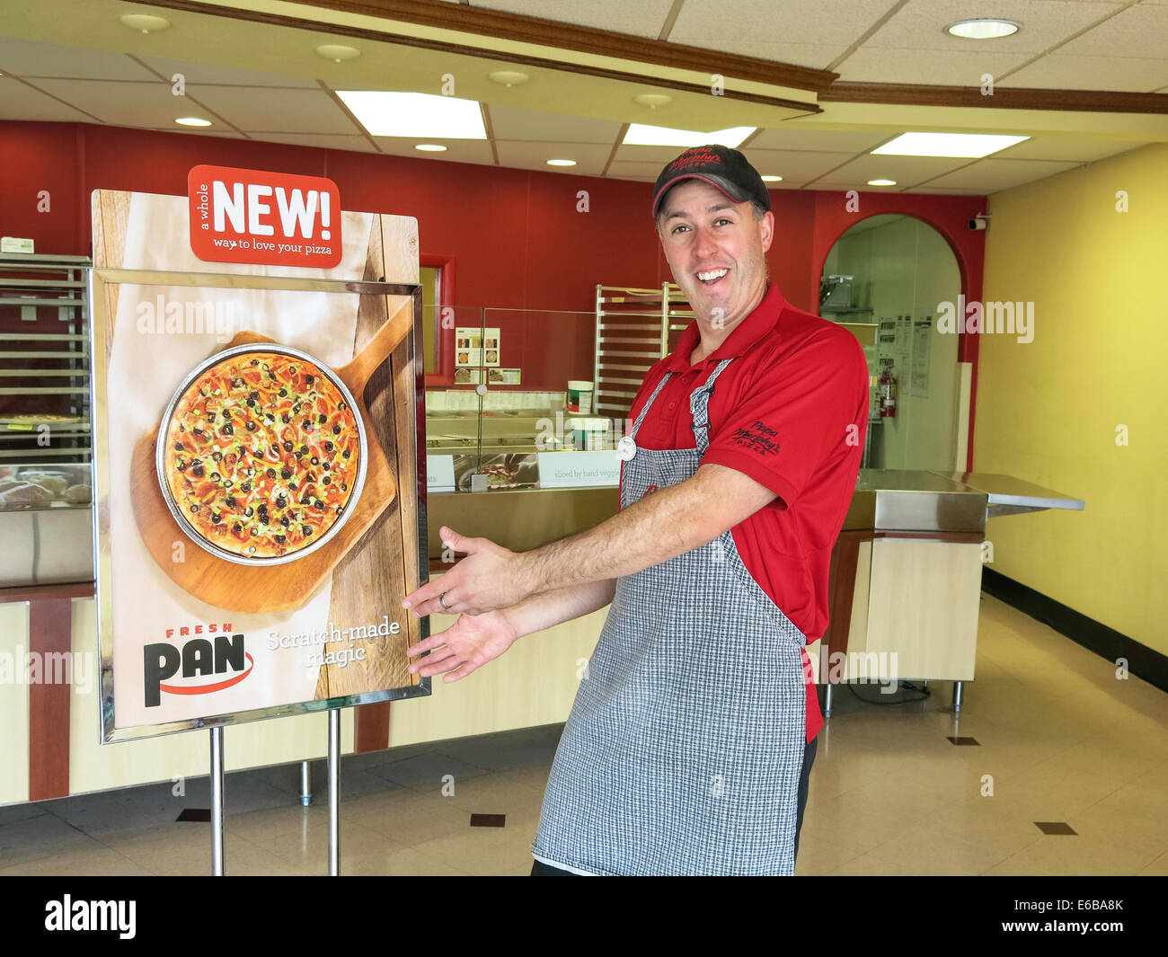 Kleinunternehmer, der Pizzeria mit Instore-Funktion Ad, USA Stockfoto