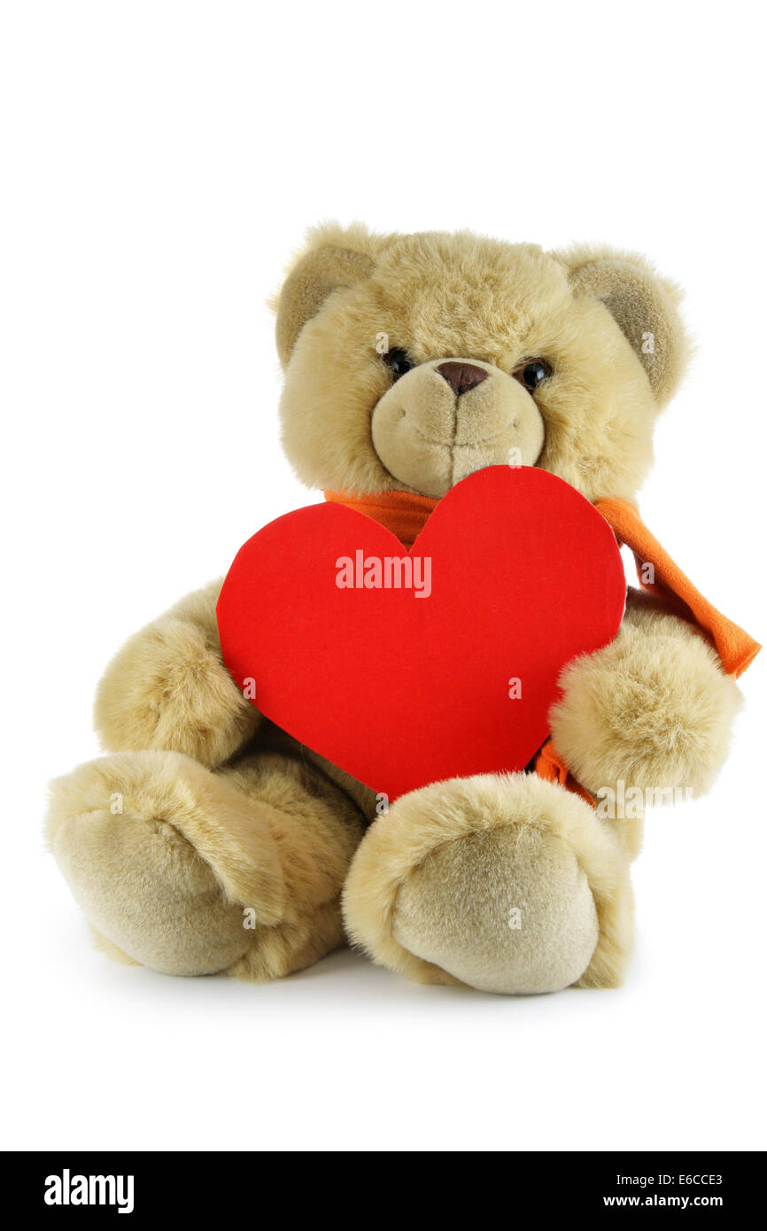 Teddybär mit großen roten Herz isoliert auf weißem Hintergrund. Setzen Sie Ihren eigenen Text über Herz. Stockfoto