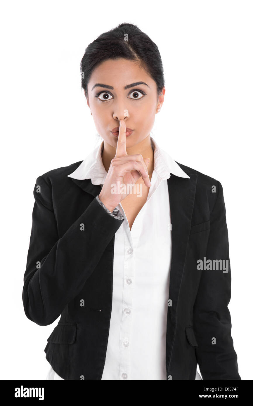 Konzept für Geheimnisse, privat, Diskretion: isolierte indische Geschäftsfrau gestikulieren mit Finger. Stockfoto