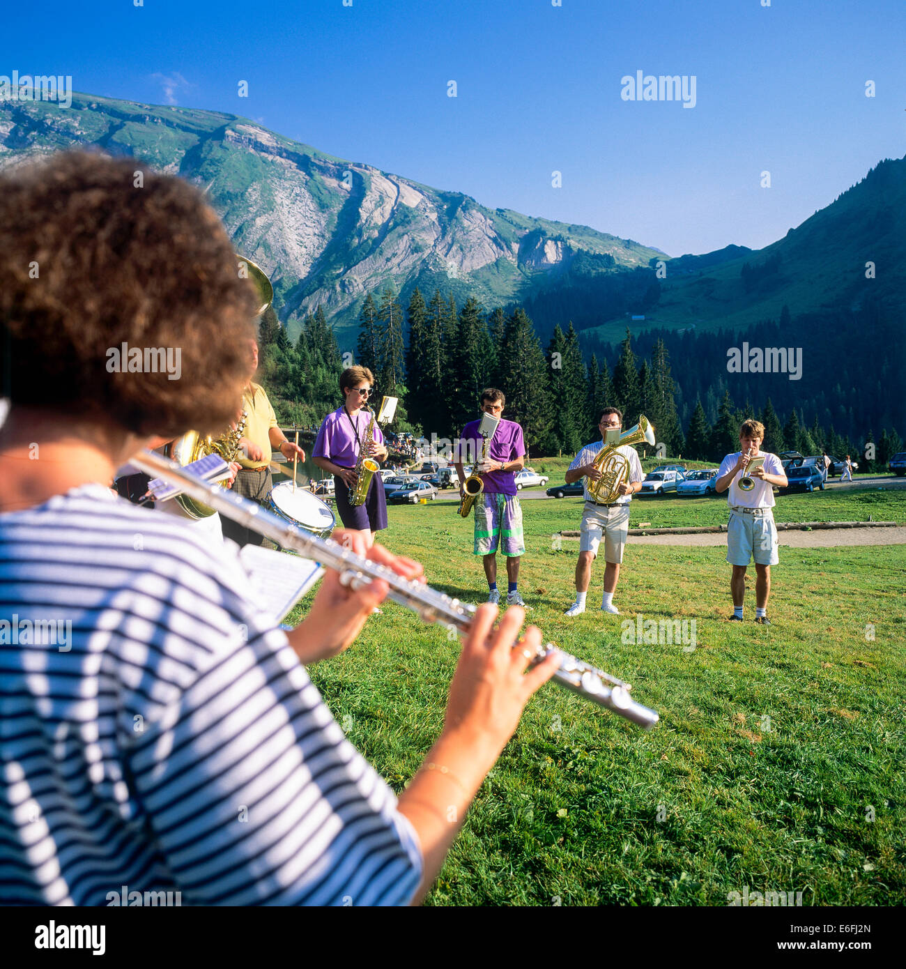 Messingband, Fagsun, Flautistenmusiker, Freiluftkonzert, Morzine Resort, Haute-Savoie, Savoyen, Französische Alpen, Frankreich, Europa Stockfoto