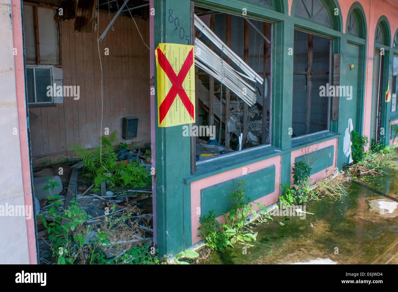 Bewohner wieder aufzubauen, zerstören Häuser und ihr Land zu verkaufen oder um die 9th Ward nach dem Hurrikan Katrina in New Orlean Rückgabe Stockfoto