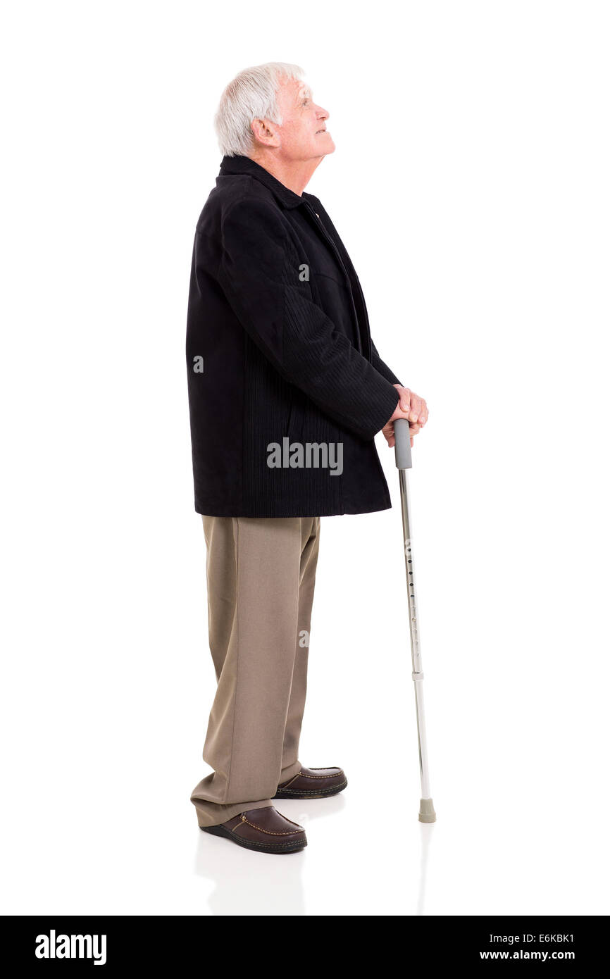 Seitenansicht des senior Mann blickte isoliert auf weiss Stockfoto