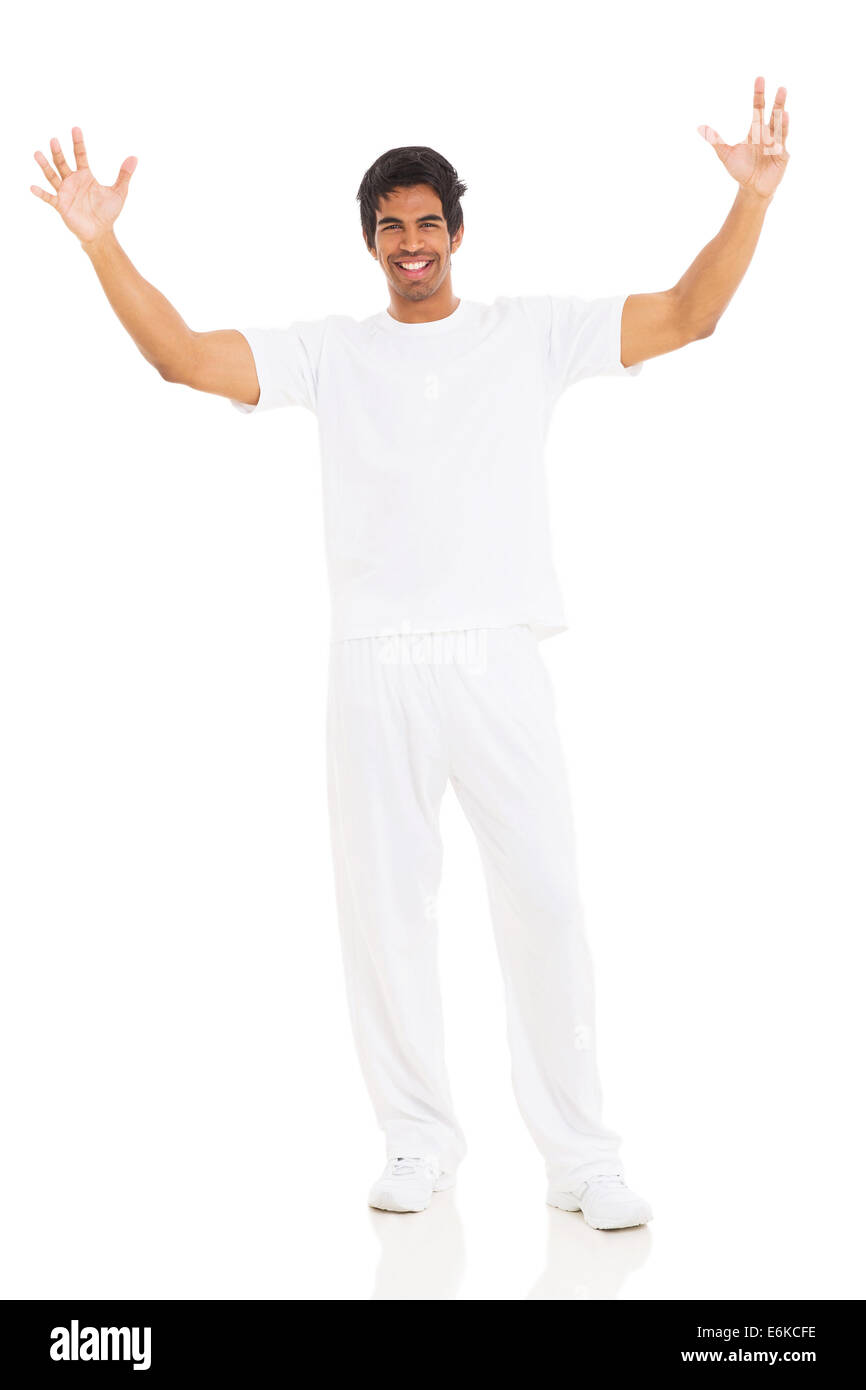 junge indische glücklich mit Arme nach oben auf weißem Hintergrund Stockfoto