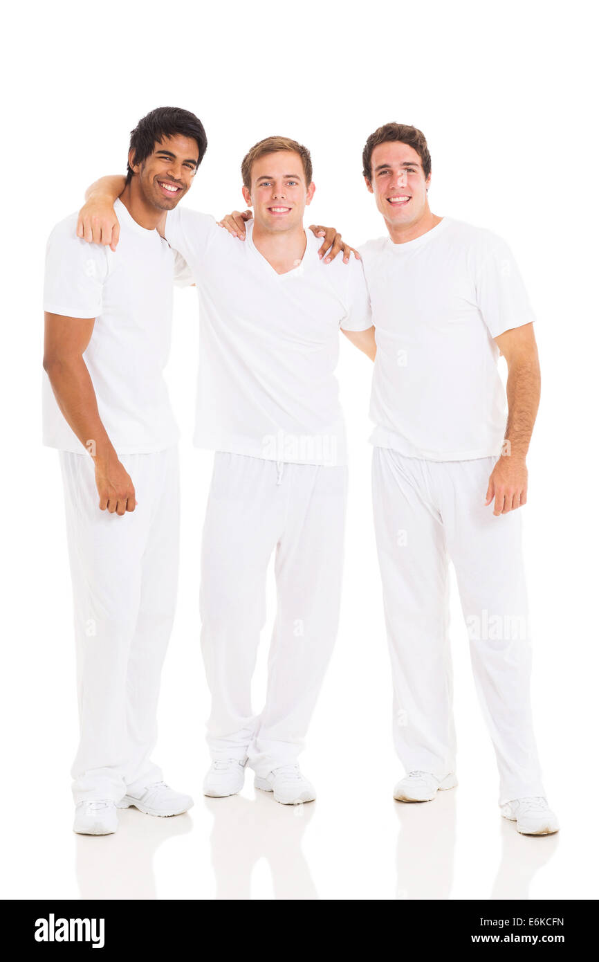 gut aussehende drei Männer posieren auf weiß Stockfoto