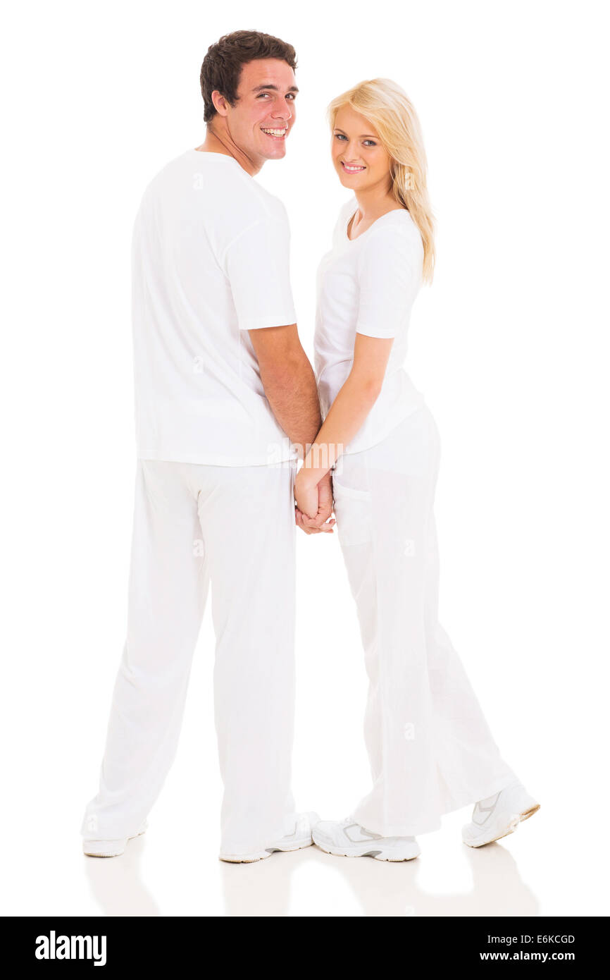 schönes Paar halten die Hände auf weißem Hintergrund Stockfoto