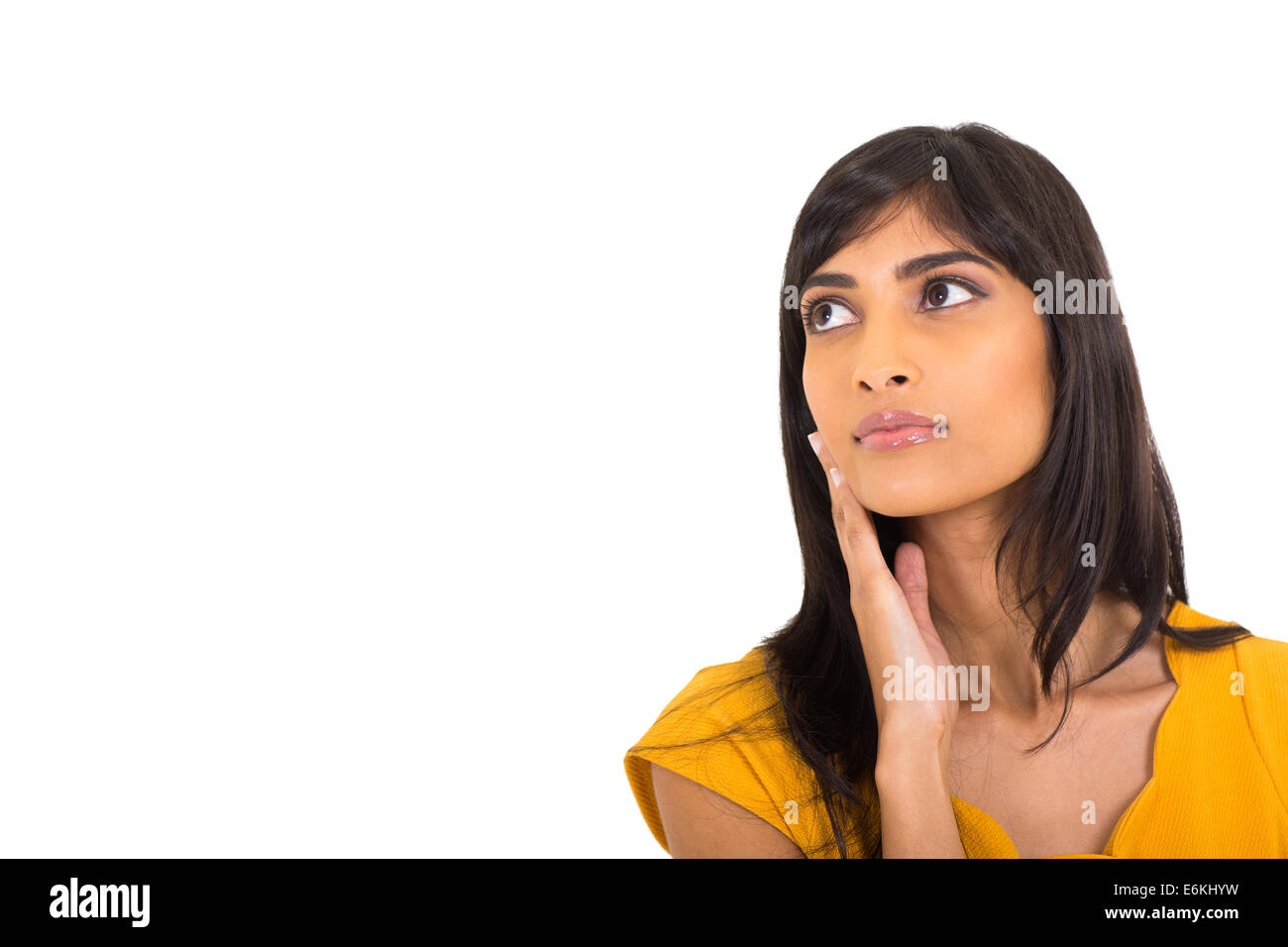 Porträt von nachdenklich indische Frau blickte auf weißem Hintergrund Stockfoto