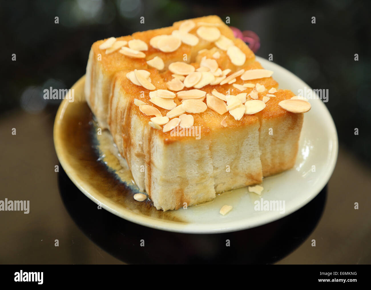 Toastbrot mit Butter und Honig Stockfoto