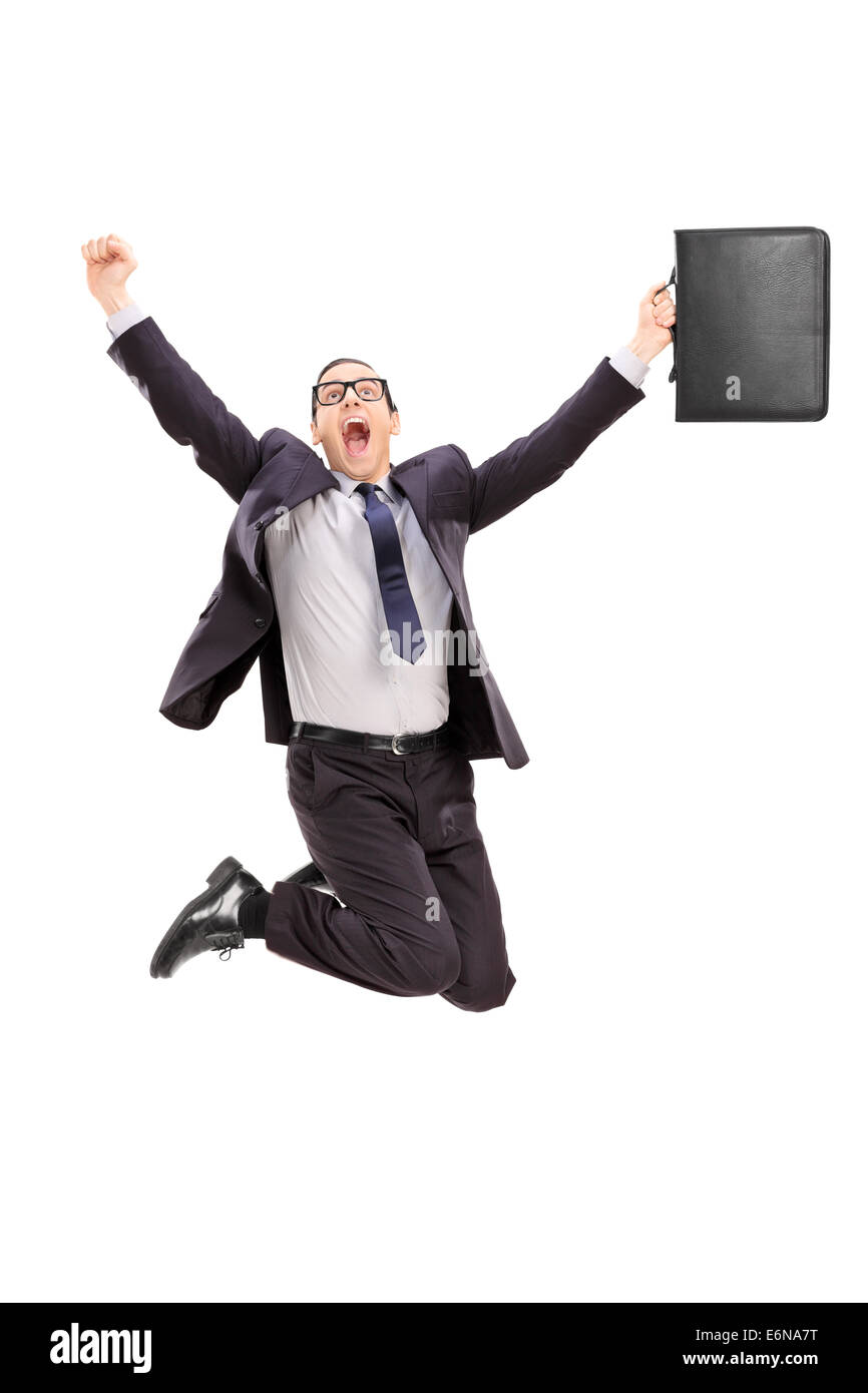 Hocherfreut Geschäftsmann springen vor Freude isoliert auf weißem Hintergrund Stockfoto