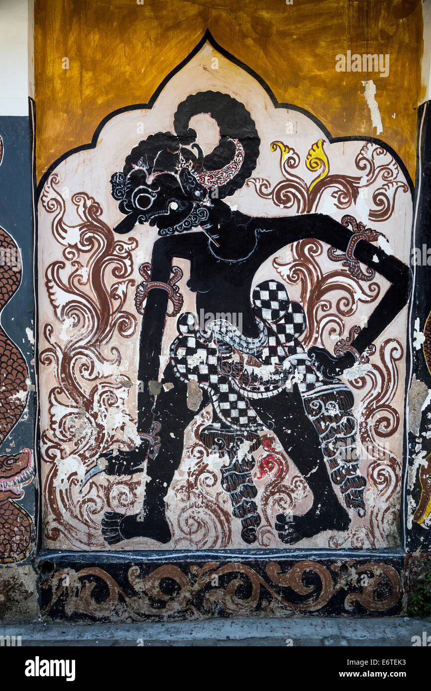 Yogyakarta, Java, Indonesien. Mythologische Figur gemalt auf der Seite von einem privaten Haus. Stockfoto