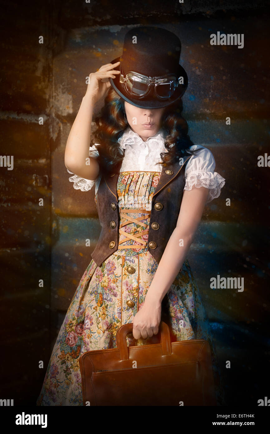 Steampunk-Mädchen mit Portfolio Ledertasche Stockfoto