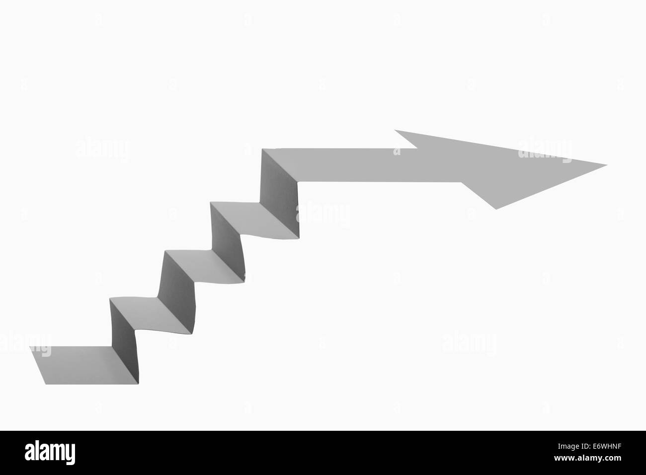 Papier-Treppen-Seitenansicht mit Pfeil-Symbol Stockfoto