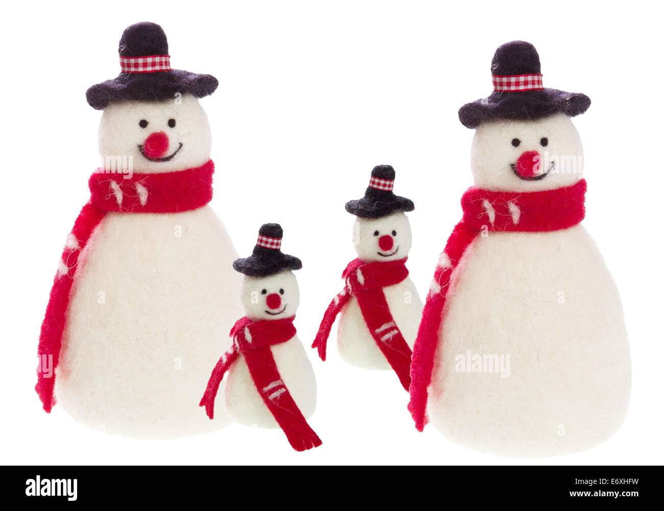 Isolierte handgemachte Schneemann mit Filz mit einem roten Schal - Familie Stockfoto