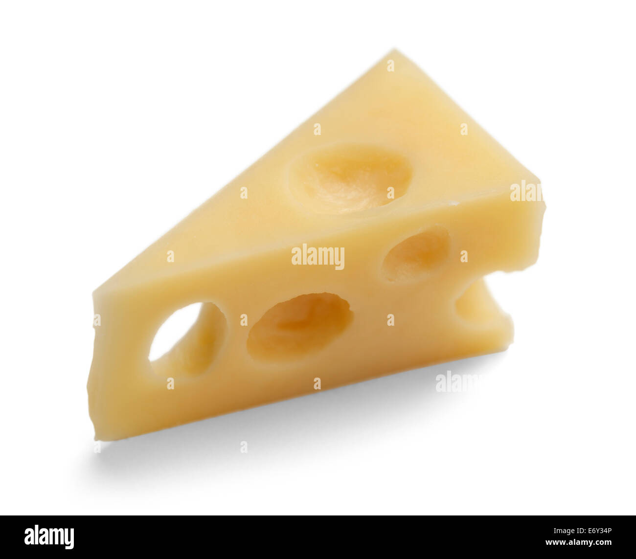 Dreieck-Käse mit Löchern, Isolated On White Background. Stockfoto