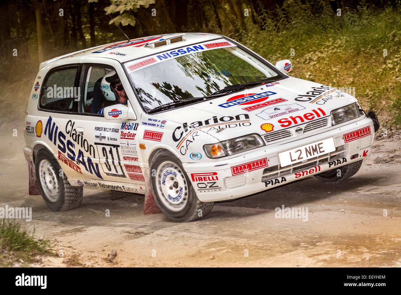1992 Nissan Sunny GTI-R mit Fahrer Stephen Rimmer, Wald-Bühne auf dem 2014 Goodwood Festival of Speed, Sussex, UK Stockfoto